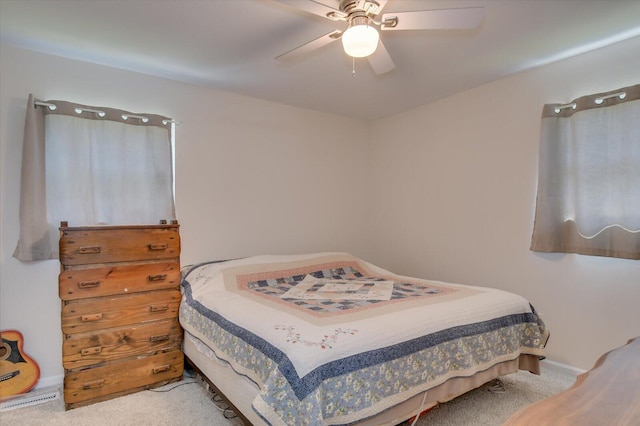 2107 Brown Rd, Hephzibah, GA 30815 - bedroom with baseboards, carpet, and ceiling fan