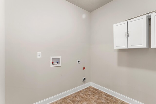 501 Cranberry Cir, Grovetown, GA 30813 - laundry room with electric dryer hookup, cabinet space, hookup for a washing machine, and light floors