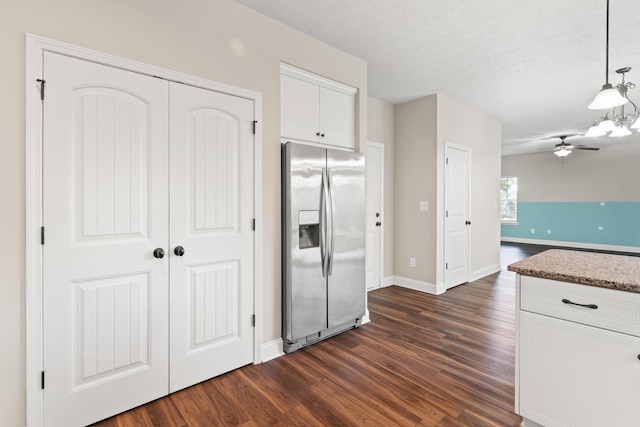 501 Cranberry Cir, Grovetown, GA 30813 - kitchen featuring stainless steel fridge, dark wood-style floors, white cabinetry, decorative light fixtures, and a ceiling fan