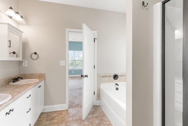 501 Cranberry Cir, Grovetown, GA 30813 - bathroom with double vanity and a garden tub