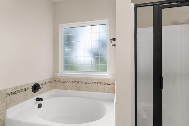 501 Cranberry Cir, Grovetown, GA 30813 - bathroom featuring plenty of natural light, a garden tub, and a shower stall