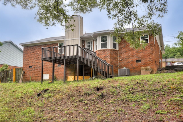 2669 Corning St, Hephzibah, GA 30815 - back of house featuring brick siding, central AC, stairs, a deck, and crawl space