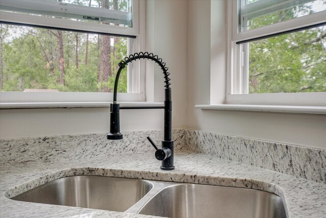 2669 Corning St, Hephzibah, GA 30815 - kitchen view of a sink and light stone counters