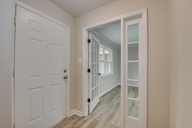 2669 Corning St, Hephzibah, GA 30815 - foyer entrance with light wood-style floors, baseboards, and crown molding