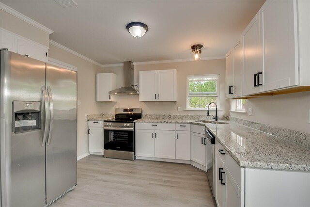 2669 Corning St, Hephzibah, GA 30815 - kitchen with stainless steel appliances, wall chimney exhaust hood, a sink, crown molding, and white cabinets