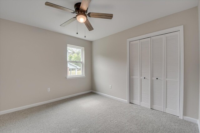 2669 Corning St, Hephzibah, GA 30815 - unfurnished bedroom featuring carpet flooring, a closet, baseboards, and ceiling fan
