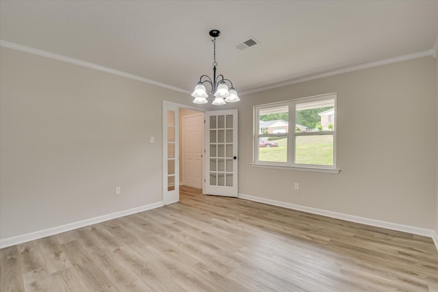 2669 Corning St, Hephzibah, GA 30815 - unfurnished room with ornamental molding, light wood-style flooring, baseboards, a chandelier, and french doors