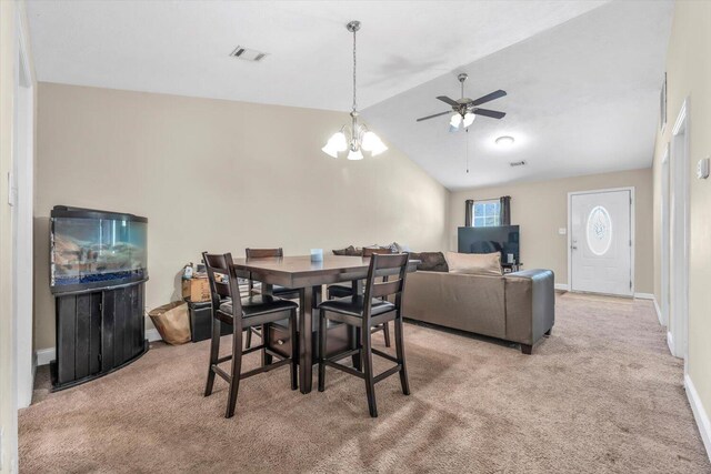 607 Beretta Dr, Grovetown, GA 30813 - dining space with a ceiling fan, light colored carpet, lofted ceiling, and a chandelier