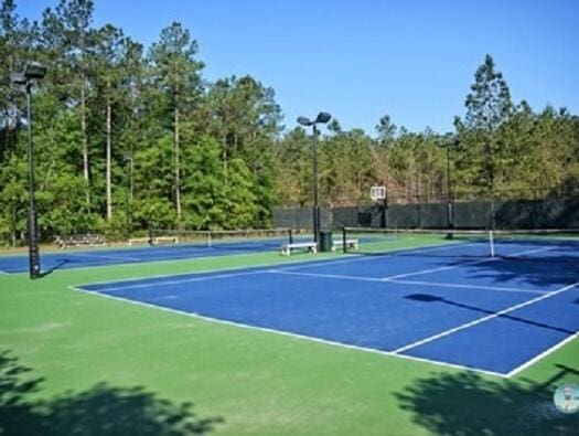 view of tennis court with basketball court