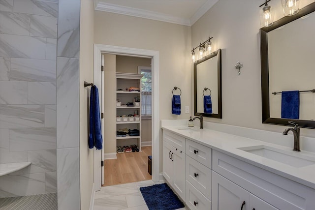 bathroom featuring vanity and ornamental molding