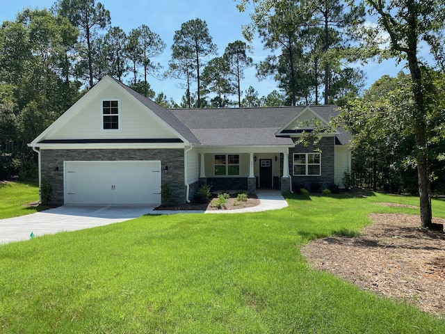 view of front facade featuring a garage and a front lawn