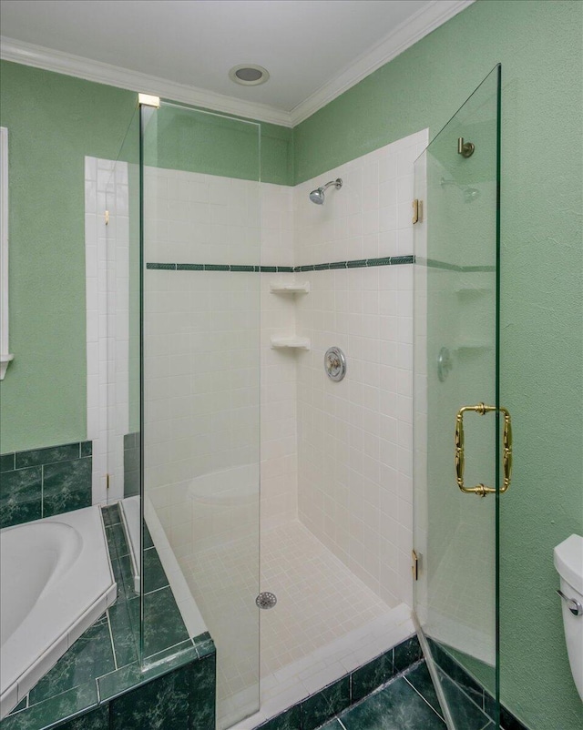 full bath with toilet, a garden tub, a shower stall, and crown molding