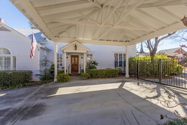 view of patio featuring fence