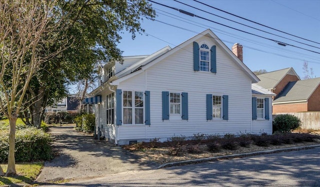 view of home's exterior featuring crawl space