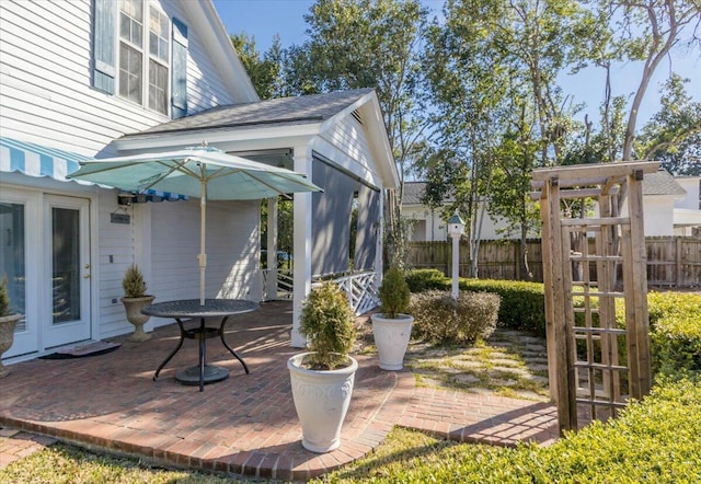 view of patio with fence