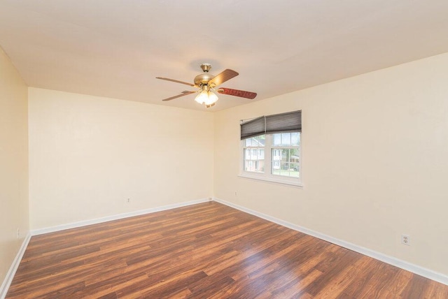 2421 Castlewood Dr, Augusta, GA 30904 - unfurnished room with dark wood finished floors, a ceiling fan, and baseboards