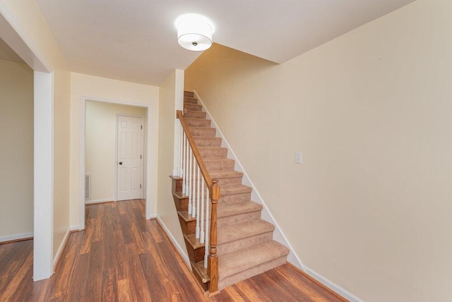 2421 Castlewood Dr, Augusta, GA 30904 - staircase with wood finished floors and baseboards