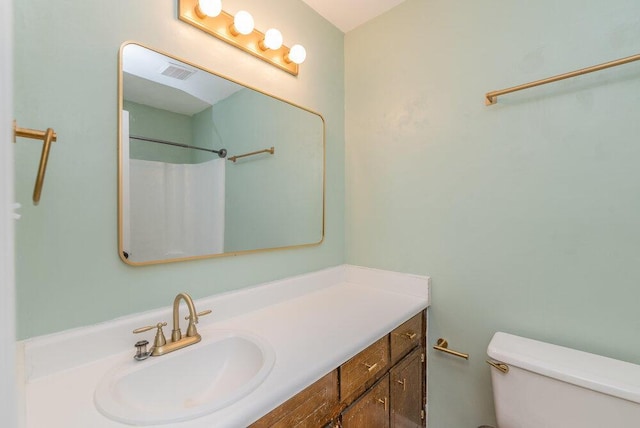 2421 Castlewood Dr, Augusta, GA 30904 - full bathroom featuring vanity, toilet, and a shower