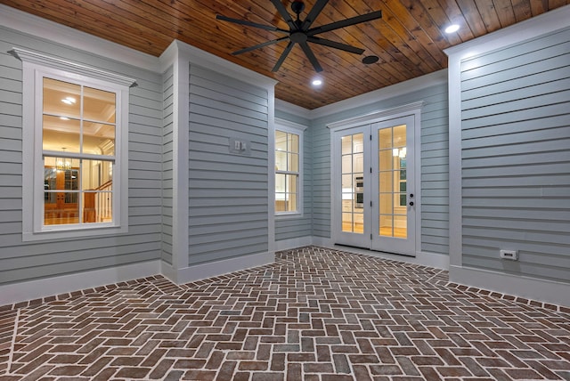 view of patio / terrace featuring french doors and ceiling fan