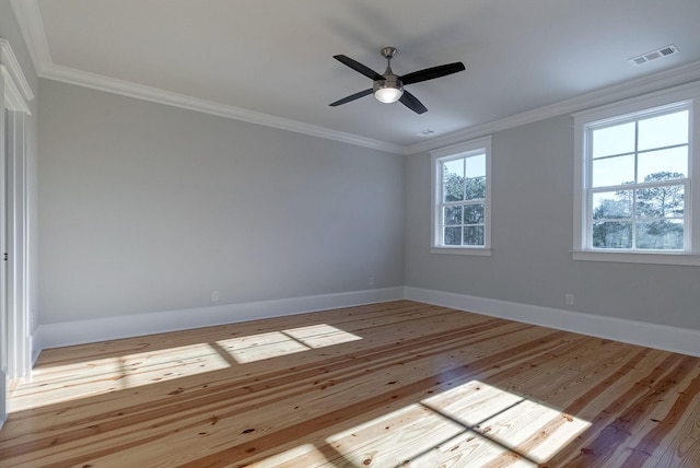 unfurnished room with light wood-type flooring, ceiling fan, and crown molding