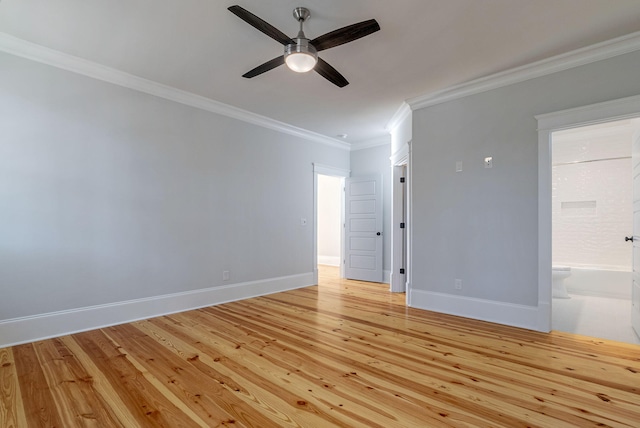 spare room featuring light hardwood / wood-style floors, ceiling fan, and ornamental molding