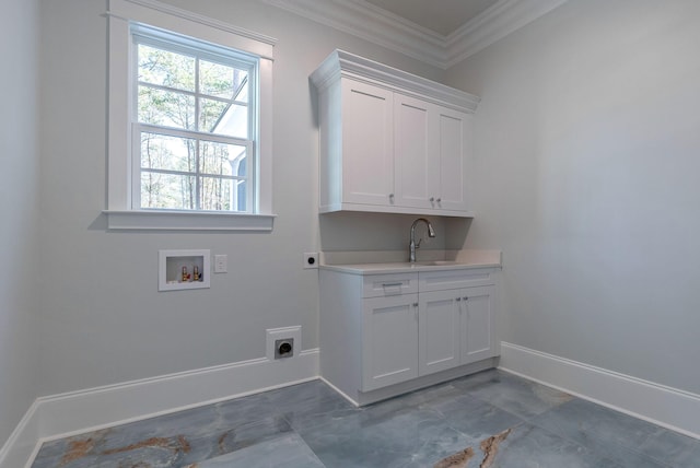 laundry area with electric dryer hookup, cabinets, sink, hookup for a washing machine, and crown molding