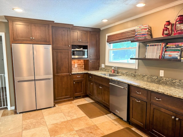 707 Pin Oak Dr, Aiken, SC 29801 - kitchen with stainless steel appliances, crown molding, open shelves, light stone countertops, and dark brown cabinets
