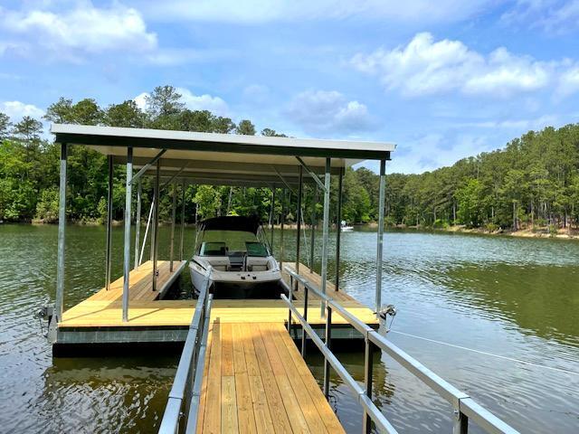 216 Sumter Ln, Mccormick, SC 29835 - dock area featuring a water view and a wooded view