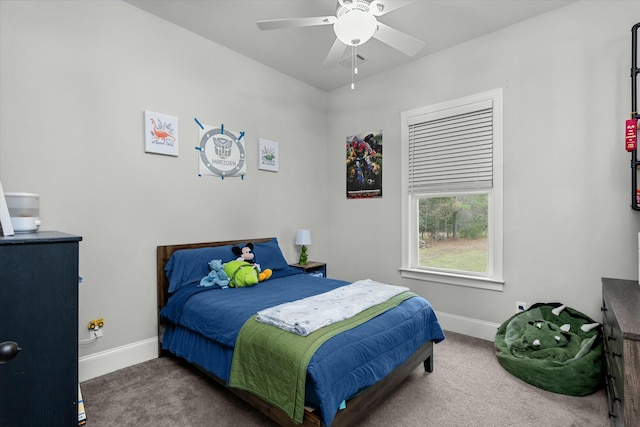 bedroom with ceiling fan and carpet