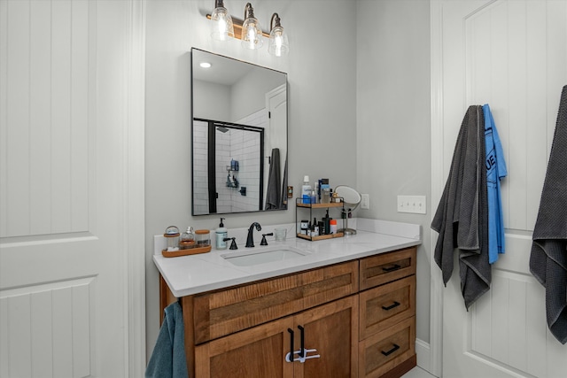 bathroom featuring vanity and walk in shower