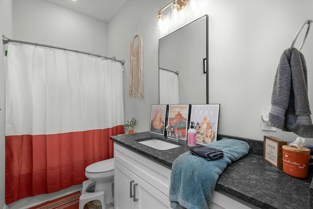 bathroom with vanity, a shower with curtain, and toilet