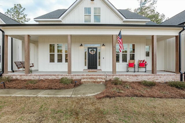 view of front of property featuring covered porch