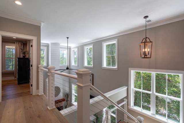 188 Lagoon Dr, Clarks Hill, SC 29821 - hall with an upstairs landing, a chandelier, light wood-style floors, crown molding, and recessed lighting