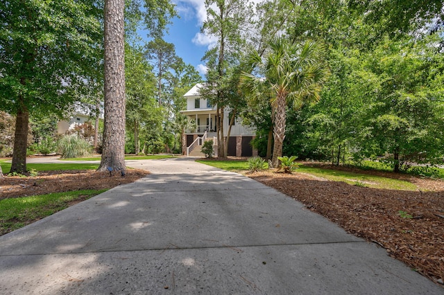 188 Lagoon Dr, Clarks Hill, SC 29821 - view of front of house featuring a porch, concrete driveway, and stairs
