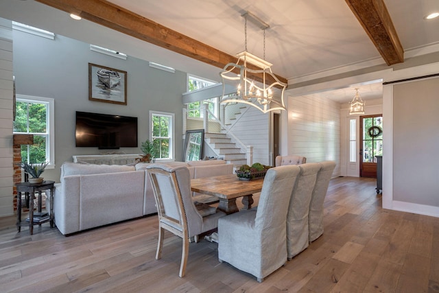 188 Lagoon Dr, Clarks Hill, SC 29821 - dining area featuring beam ceiling, stairway, light wood-type flooring, and a chandelier