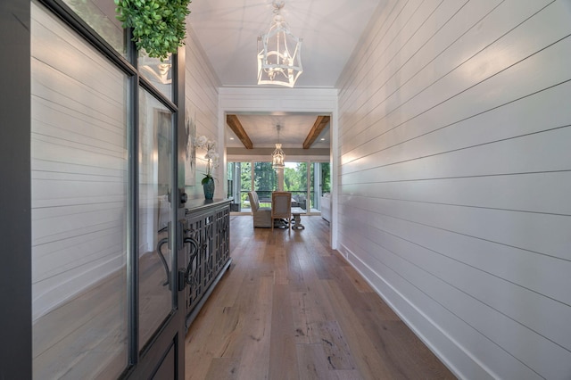 188 Lagoon Dr, Clarks Hill, SC 29821 - hall with a chandelier, wood walls, french doors, and wood finished floors