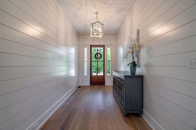 188 Lagoon Dr, Clarks Hill, SC 29821 - entryway featuring a chandelier, dark wood-style floors, and wood walls
