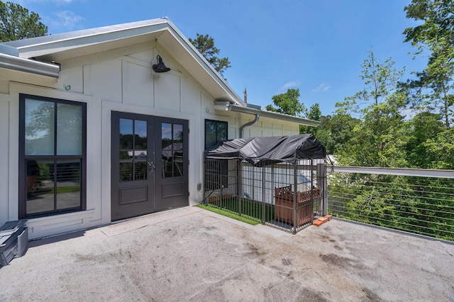 188 Lagoon Dr, Clarks Hill, SC 29821 - view of exterior entry featuring board and batten siding and french doors