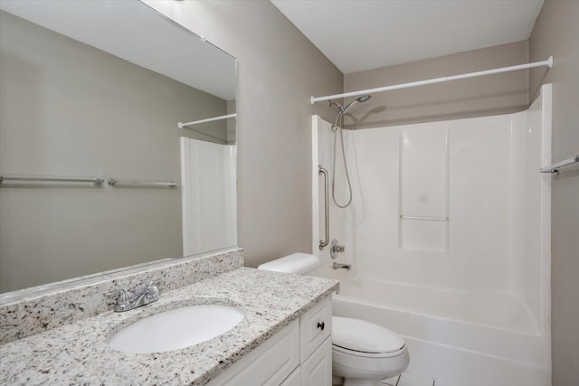 bathroom with toilet, shower / washtub combination, and vanity