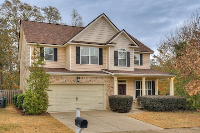 craftsman house with a garage