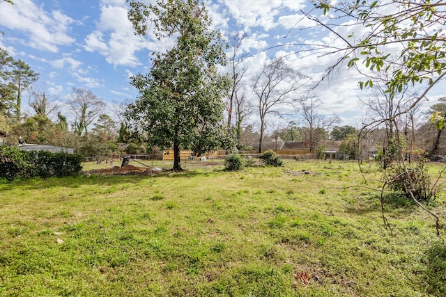 view of yard featuring fence