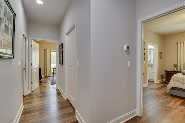 1370 Deerwood Cir, Stapleton, GA 30823 - corridor with wood finished floors and recessed lighting