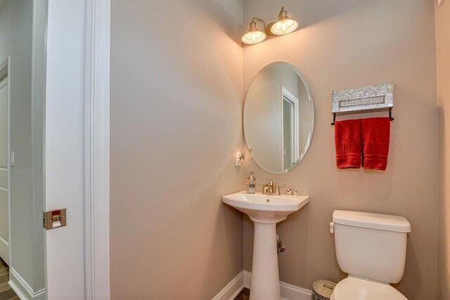 1370 Deerwood Cir, Stapleton, GA 30823 - bathroom featuring toilet and baseboards