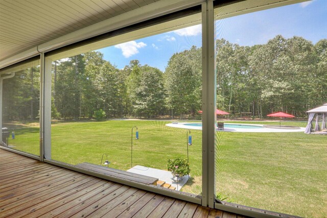 unfurnished sunroom featuring a healthy amount of sunlight