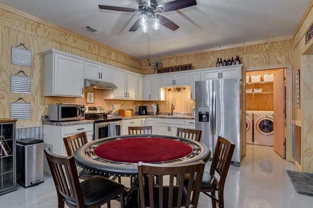 1370 Deerwood Cir, Stapleton, GA 30823 - dining space with washing machine and clothes dryer and ceiling fan