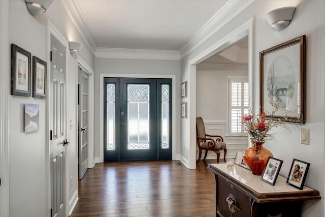 entryway with crown molding and dark wood-style flooring