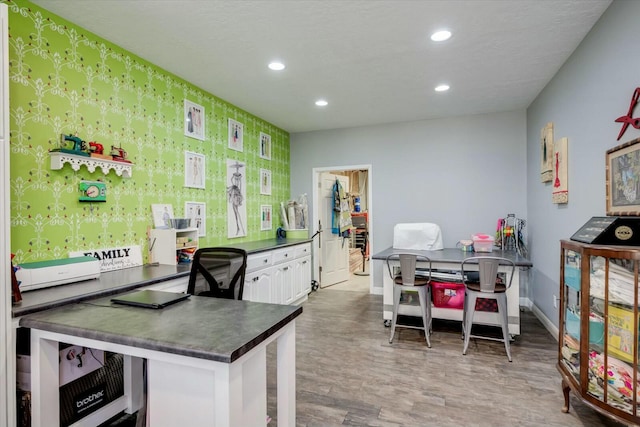 home office featuring recessed lighting, baseboards, beverage cooler, and wood finished floors