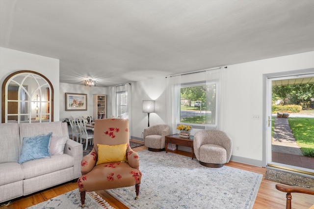 818 Hillside Dr, North Augusta, SC 29841 - living area featuring healthy amount of natural light, wood finished floors, and baseboards