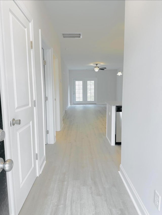 hall featuring light hardwood / wood-style floors