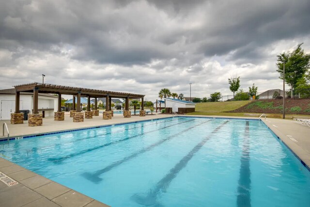3120 Wayne Dr, Evans, GA 30809 - community pool featuring a patio